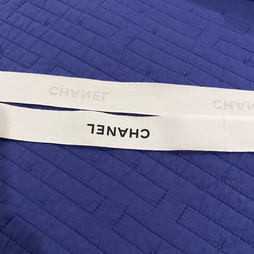 2 AUTHENTIC Chanel strings that came with purchase.